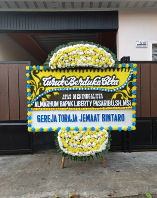 Papan Bunga Duka di Trirukun